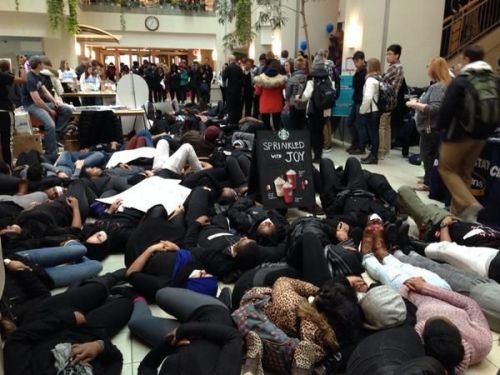 Images of Penn State students staging a die-in